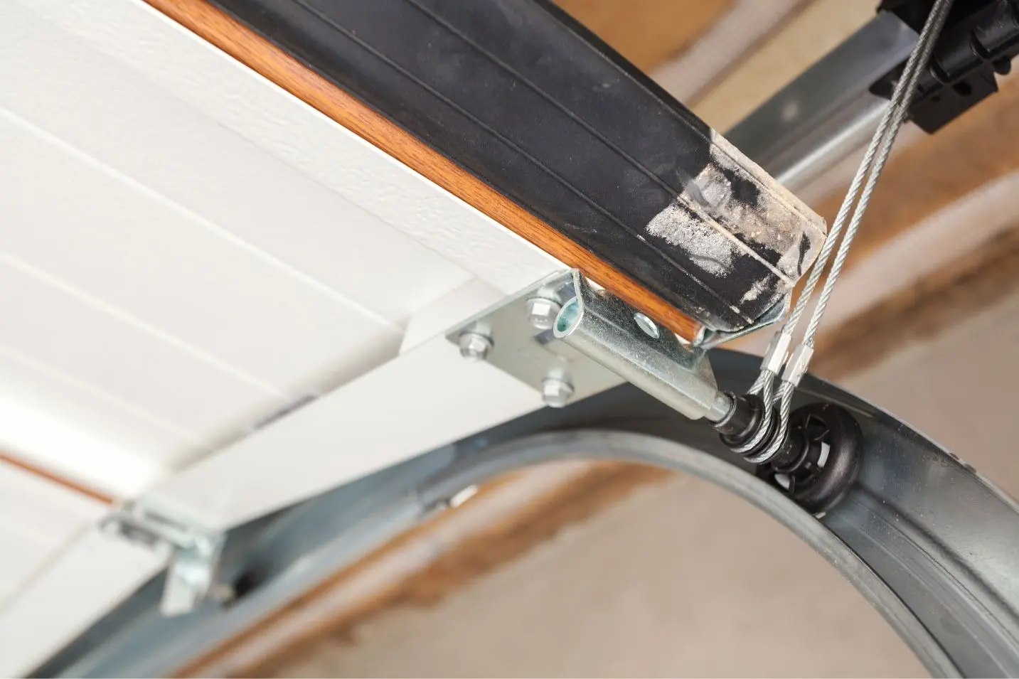 Routine maintenance service for residential garage doors