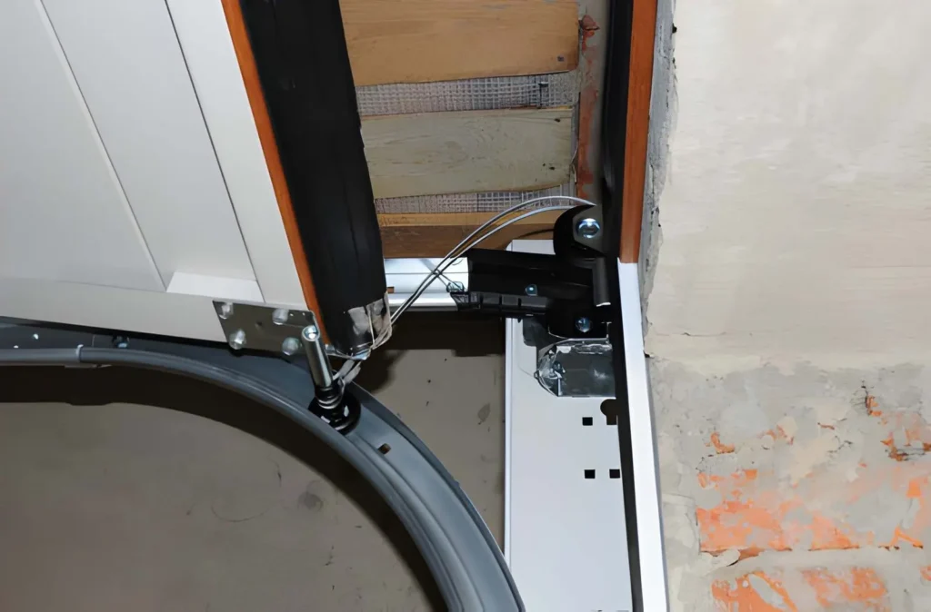 Professional Garage Door Fix replacing broken torsion spring safely