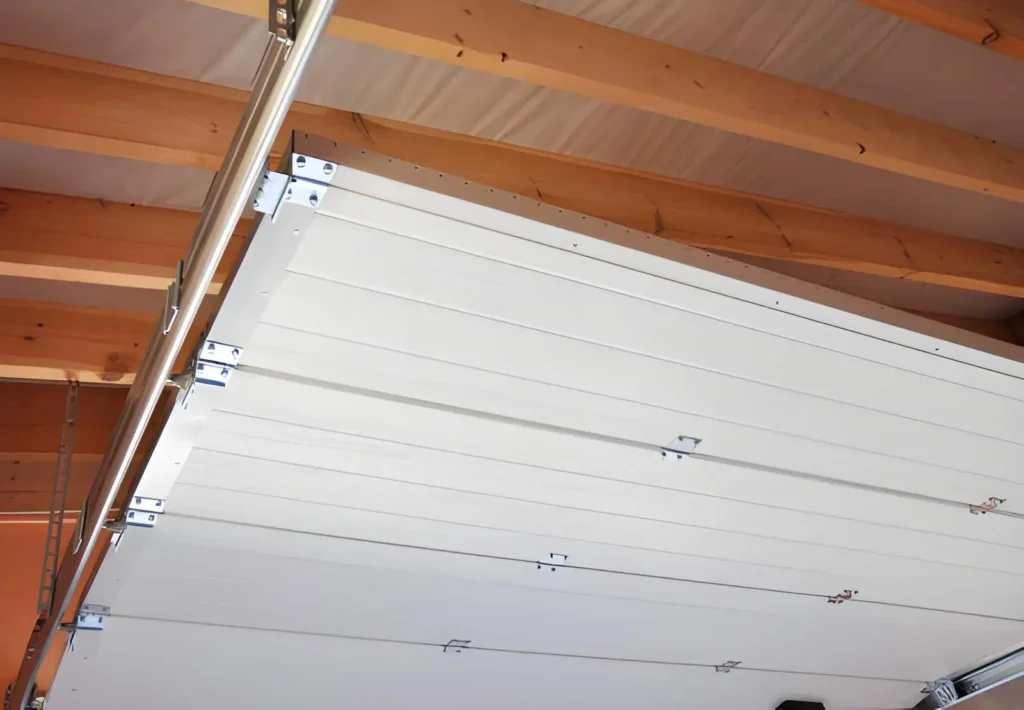 Expert doing LiftMaster Garage Door Opener Repair on safety sensors